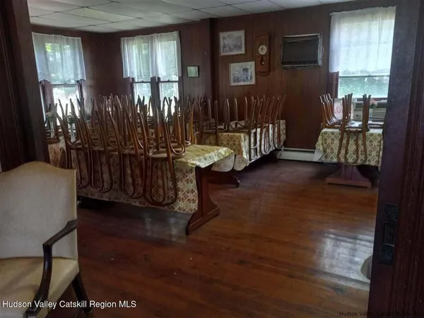 swimming pool view with a outdoor seating space