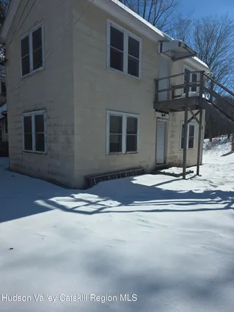 a view of building with traffic signal lights