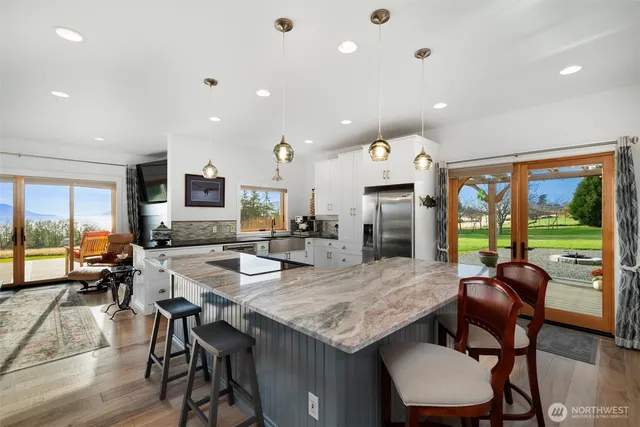 a view of a dining room with furniture window and outside view