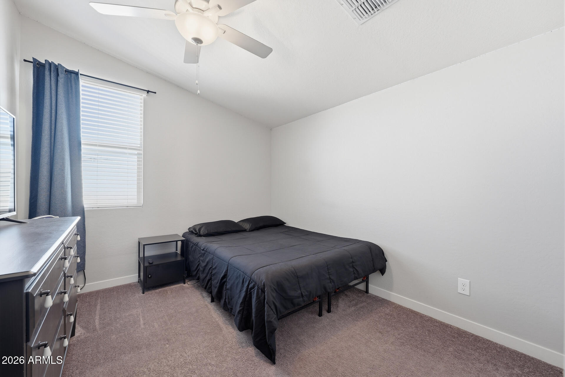 23069 East Mayberry Road Queen Creek, AZ 85142 - Photo 31 of 48 a bedroom with a bed and a table