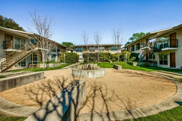 a view of swimming pool with a yard