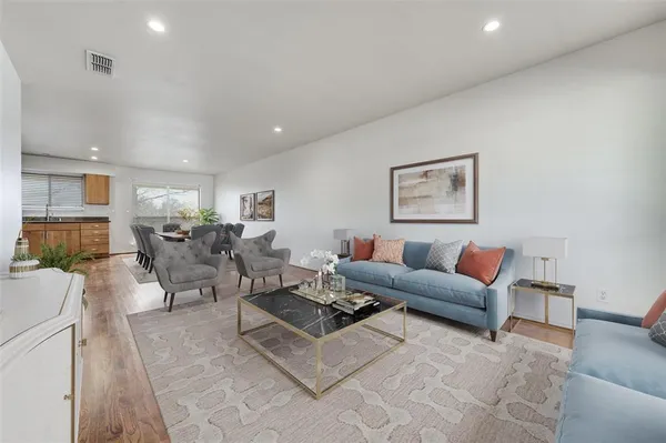 a living room with furniture and a couch