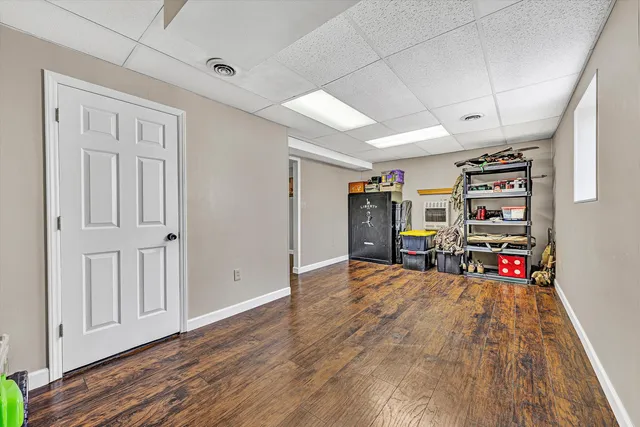 a very nice looking room with wooden floor