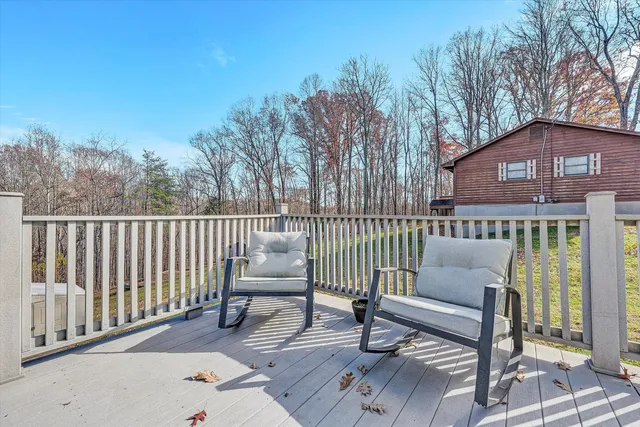 a view of balcony with furniture