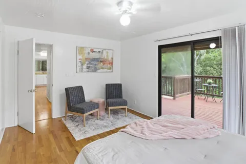 a view of balcony with furniture