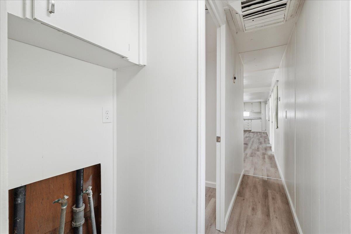 1525 Cold Springs Road, Unit 48 Placerville, CA 95667 - Photo 17 of 23 a view of a hallway with wooden floor