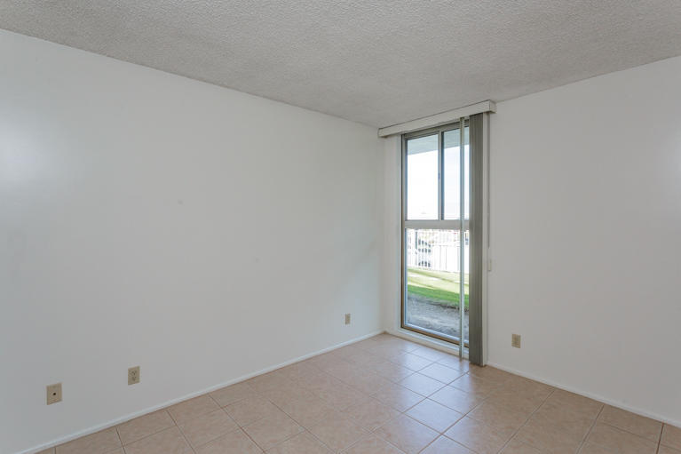 42308 Dunes View Road, Unit 20 Rancho Mirage, CA 92270 - Photo 14 of 30 a view of an empty room and window