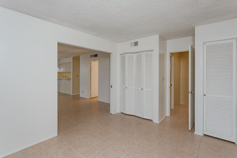 42308 Dunes View Road, Unit 20 Rancho Mirage, CA 92270 - Photo 16 of 30 a view of a hallway with closet and wooden floor