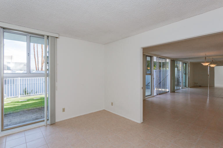 42308 Dunes View Road, Unit 20 Rancho Mirage, CA 92270 - Photo 17 of 30 wooden floor in an empty room with a window
