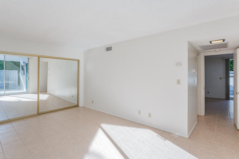 42308 Dunes View Road, Unit 20 Rancho Mirage, CA 92270 - Photo 19 of 30 a view of an empty room with a window