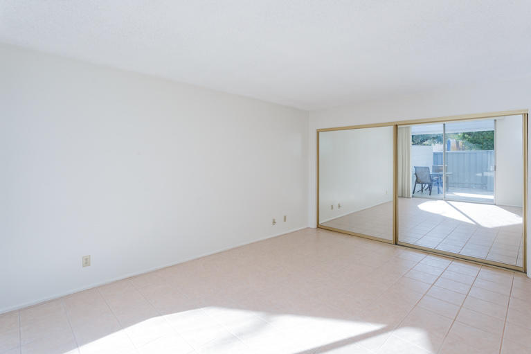42308 Dunes View Road, Unit 20 Rancho Mirage, CA 92270 - Photo 20 of 30 a view of an empty room with a fireplace