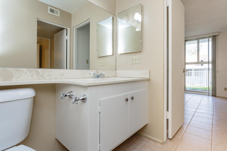 42308 Dunes View Road, Unit 20 Rancho Mirage, CA 92270 - Photo 22 of 30 a bathroom with a sink and a mirror