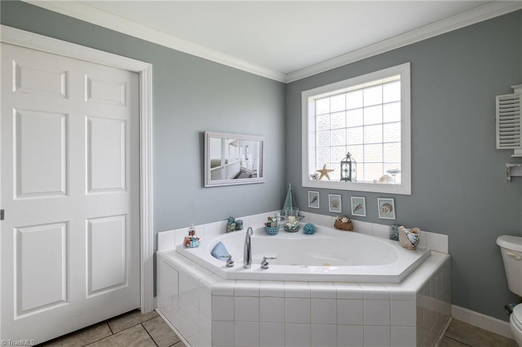 447 Culler Road Pinnacle, NC 27043 - Photo 15 of 36 Jetted tub and very large walk in closet