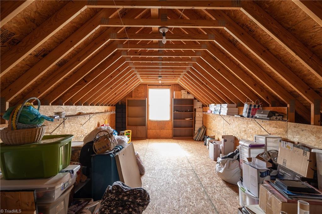 447 Culler Road Pinnacle, NC 27043 - Photo 24 of 36 Extremely large walk-in attic off of the upstairs den/loft area