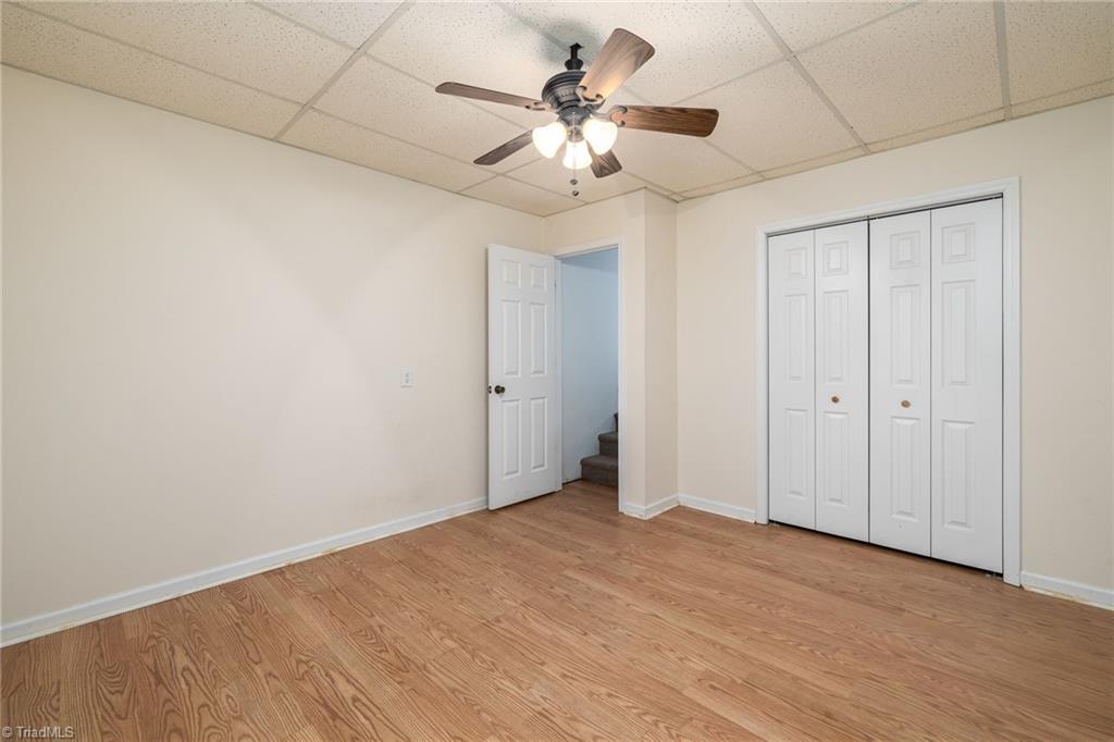 447 Culler Road Pinnacle, NC 27043 - Photo 26 of 36 Basement bonus room with closet