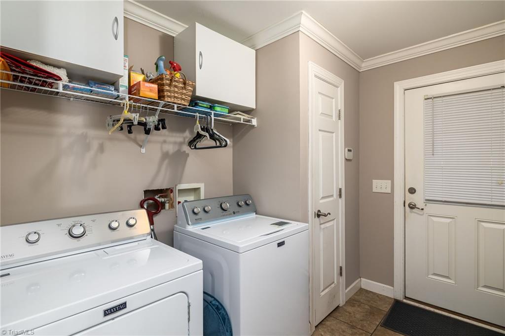 447 Culler Road Pinnacle, NC 27043 - Photo 27 of 36 laundry/mudroom off the double car garage