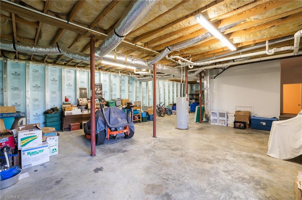 447 Culler Road Pinnacle, NC 27043 - Photo 28 of 36 Very large unfinished basement/workshop area