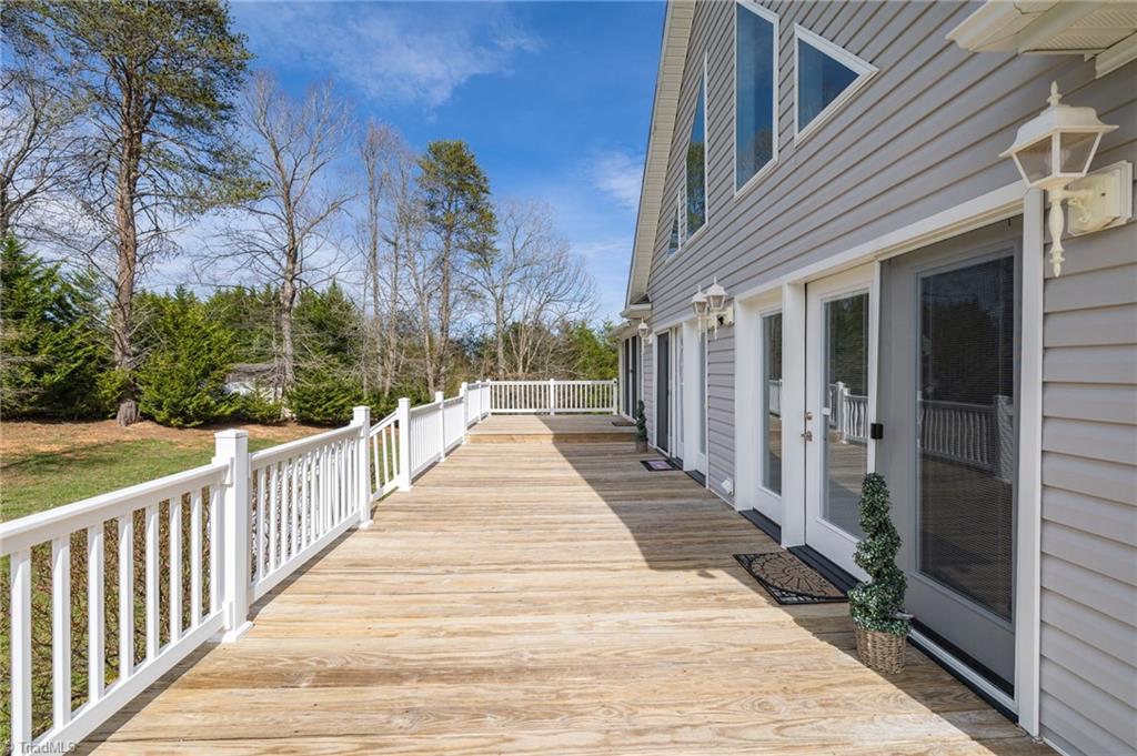 447 Culler Road Pinnacle, NC 27043 - Photo 3 of 36 Large wrap around, multi-level deck