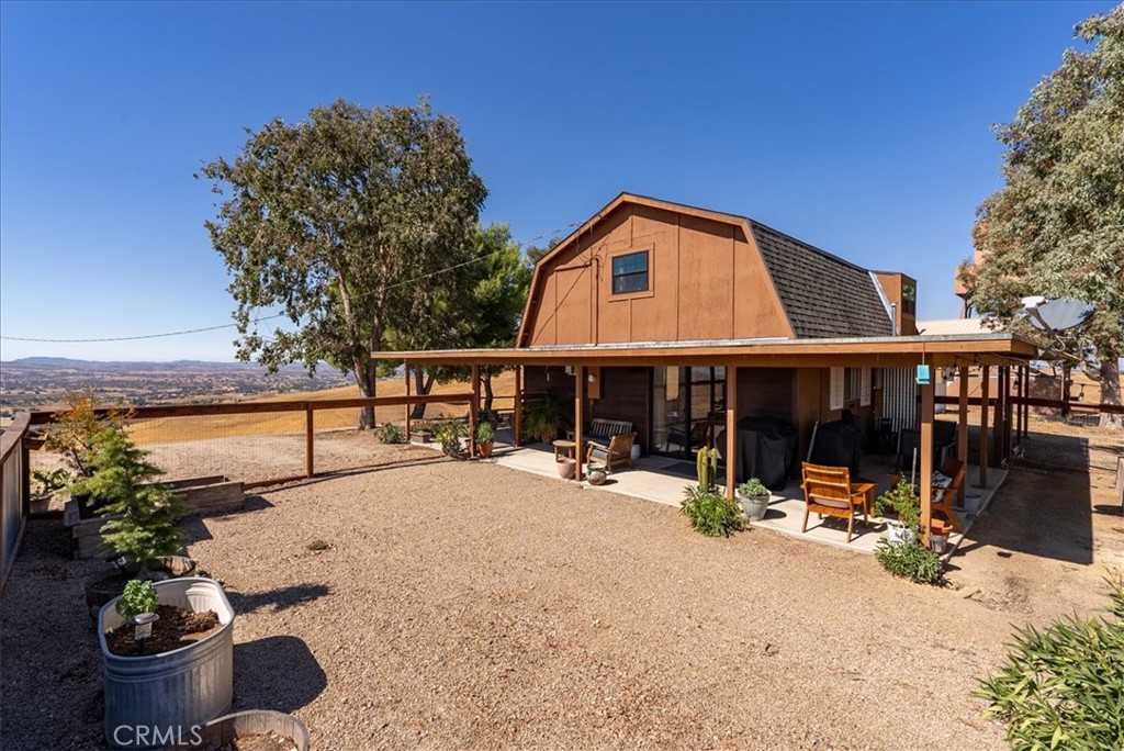 3815 Highway 41 Paso Robles, CA 93446 - Photo 34 of 40 a view of a house with a yard and sitting area