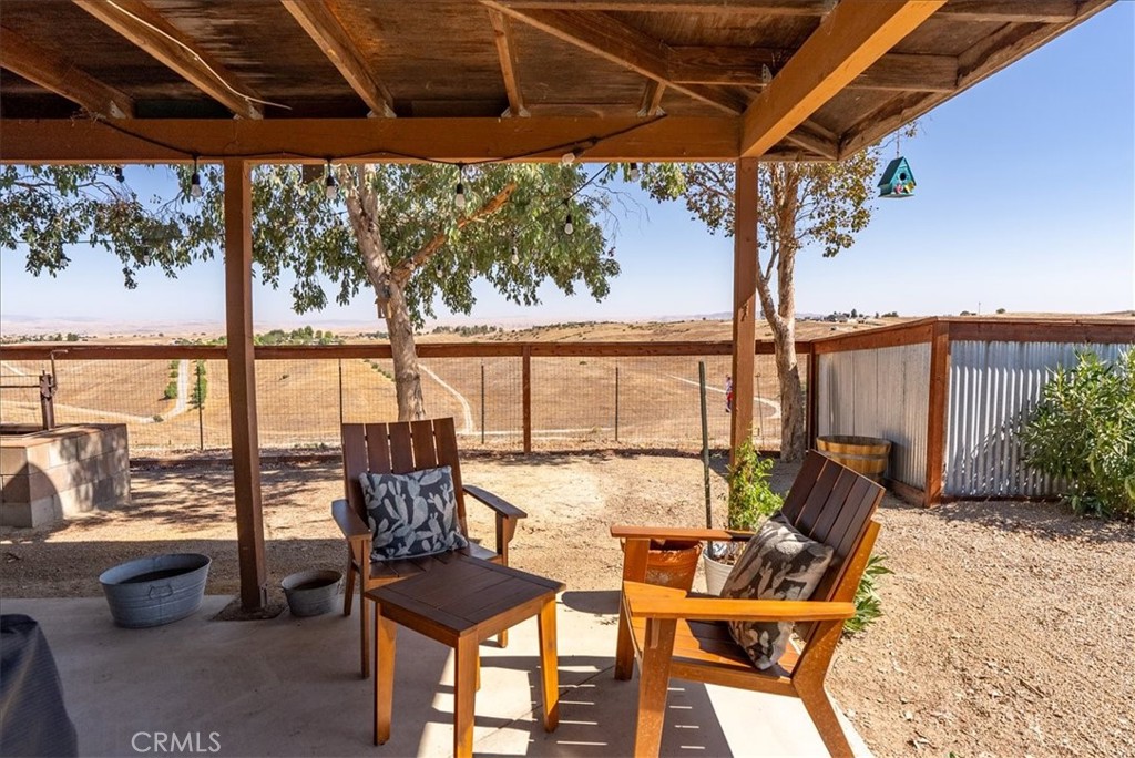 3815 Highway 41 Paso Robles, CA 93446 - Photo 35 of 40 a view of balcony with chairs and wooden floor