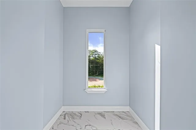 a view of an entryway with a window
