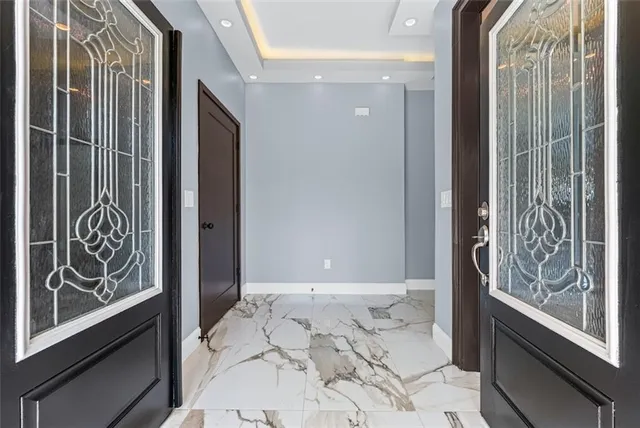 a bathroom with a bathtub and shower