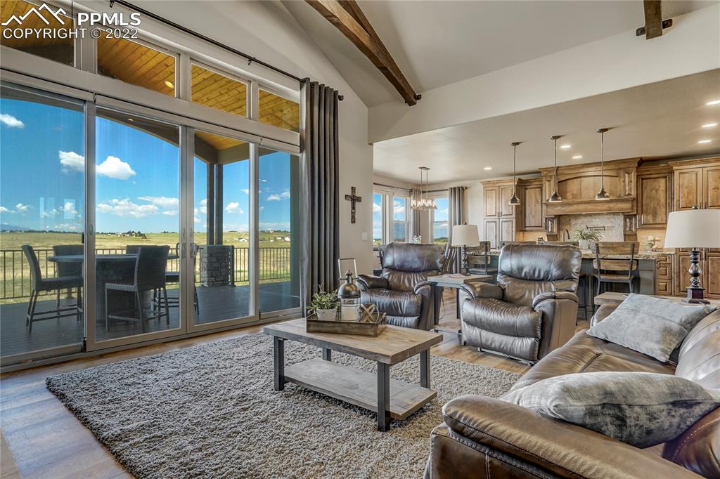 14325 Evans Road Elbert, CO 80106 - Photo 13 of 49 a living room with furniture and a rug