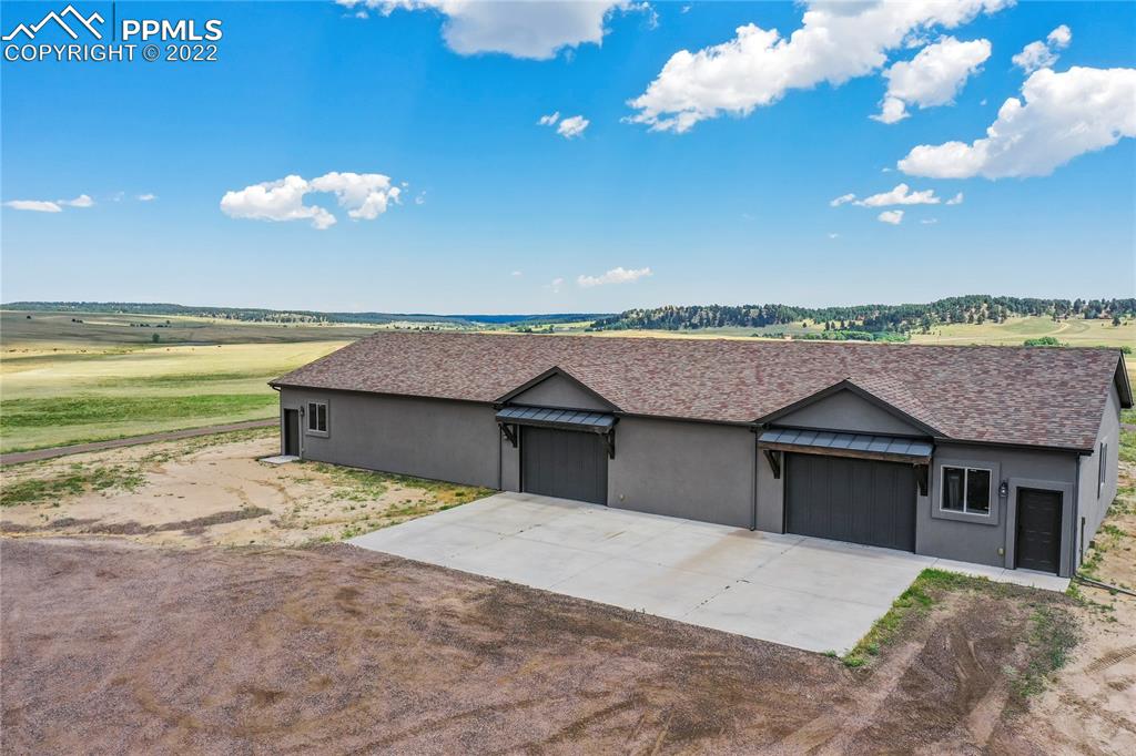 14325 Evans Road Elbert, CO 80106 - Photo 6 of 49 a view of a house with a terrace space