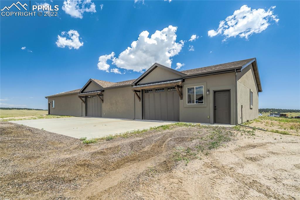 14325 Evans Road Elbert, CO 80106 - Photo 8 of 49 a big room with chandelier