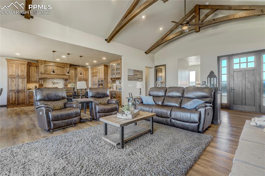 14325 Evans Road Elbert, CO 80106 - Photo 10 of 49 a living room with furniture and a rug