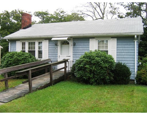 7 Nokomis Road Wareham, MA 02532 - Photo 1 of 1 a front view of a house with a garden