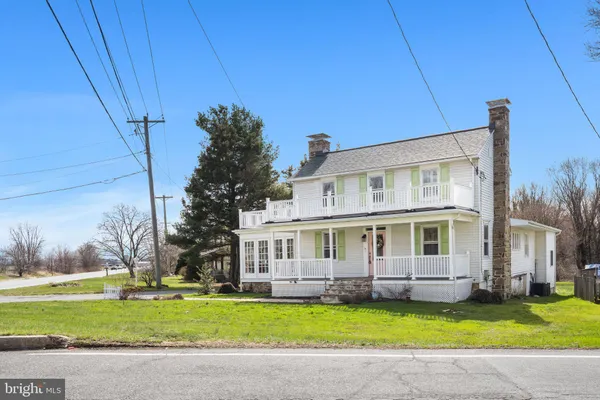 a view of a house with a swimming pool