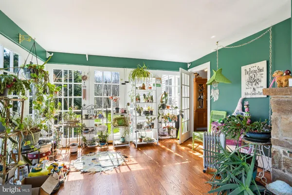 a view of livingroom with furniture and floor to ceiling window