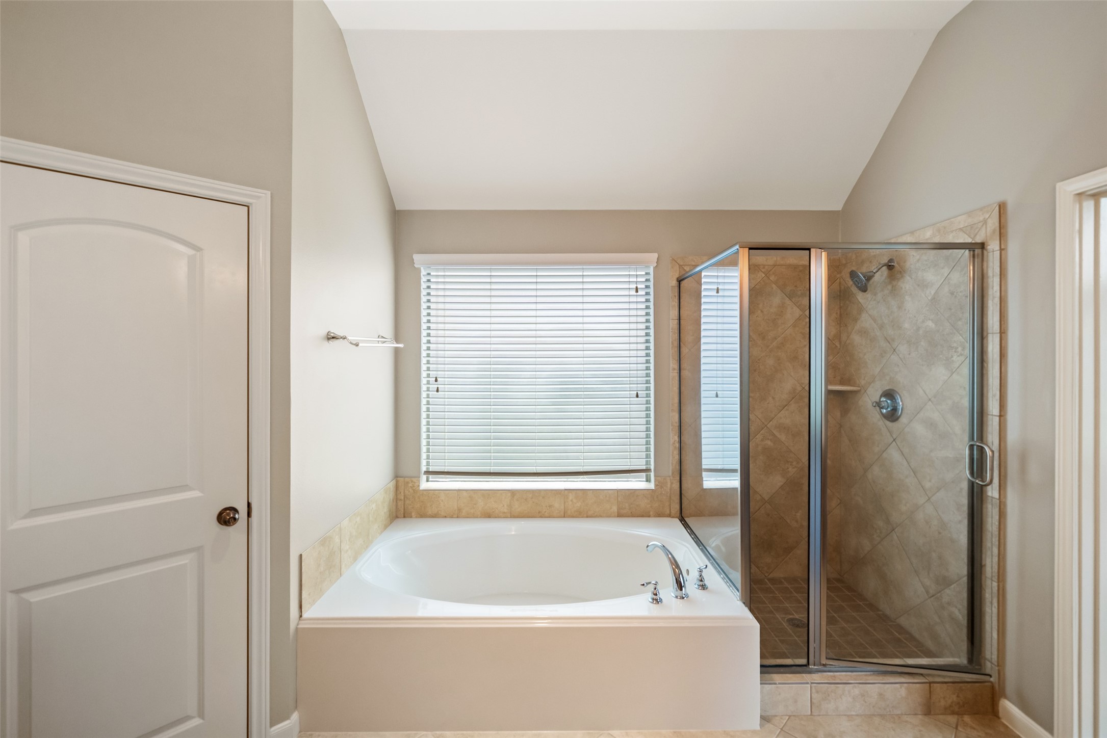 2818 Red Maple Drive Katy, TX 77494 - Photo 41 of 50 a bathroom with a bathtub and a shower