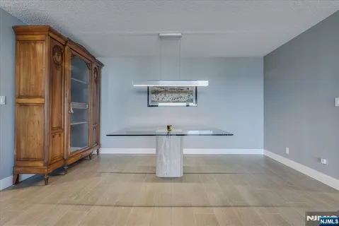 a view of a refrigerator in a kitchen