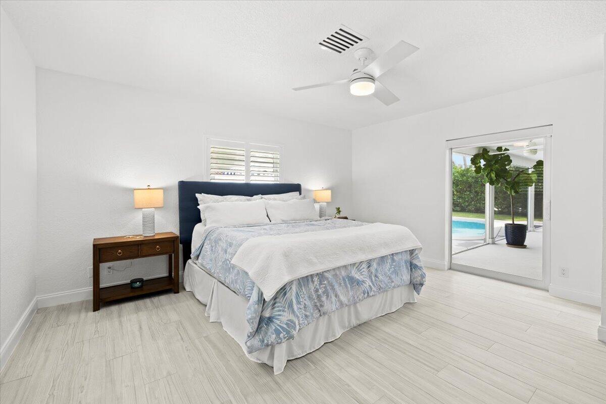 38 Southwest 10th Avenue Boca Raton, FL 33486 - Photo 21 of 44 Primary Bedroom | Direct Patio Access