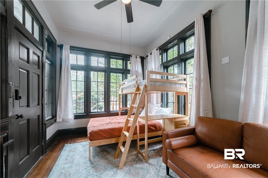 207 Michigan Avenue Mobile, AL 36604 - Photo 9 of 31 Bedroom with wood finished floors and a ceiling fan