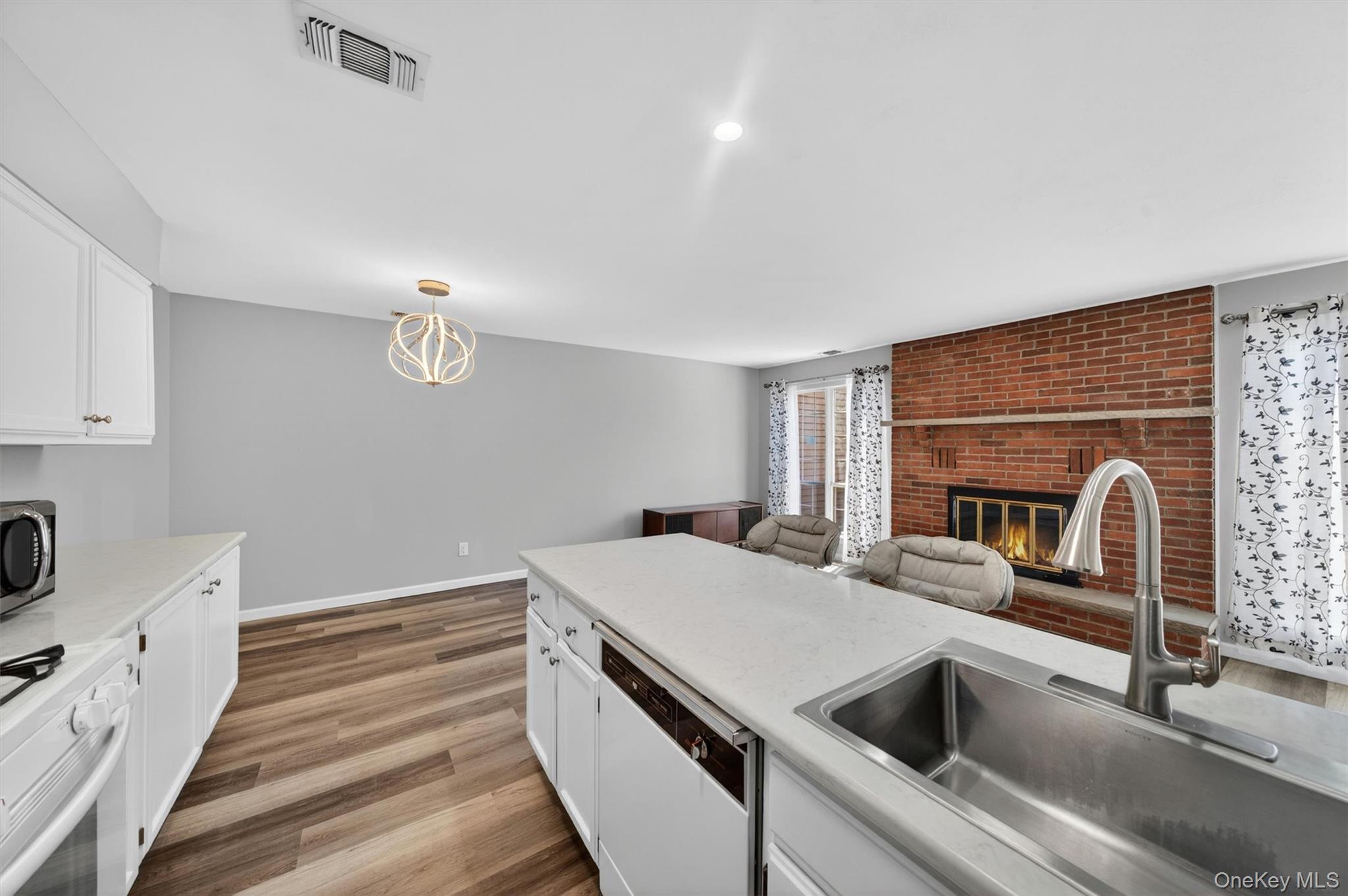 43 The Rise Warwick, NY 10990 - Photo 24 of 49 a kitchen with a refrigerator and a sink
