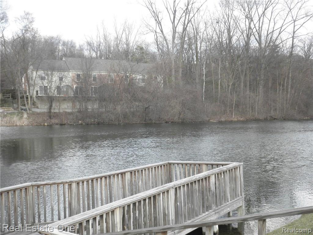 1389 Paddle Wheel Lane Rochester, MI 48306 - Photo 28 of 32 Aesthetic pond in complex