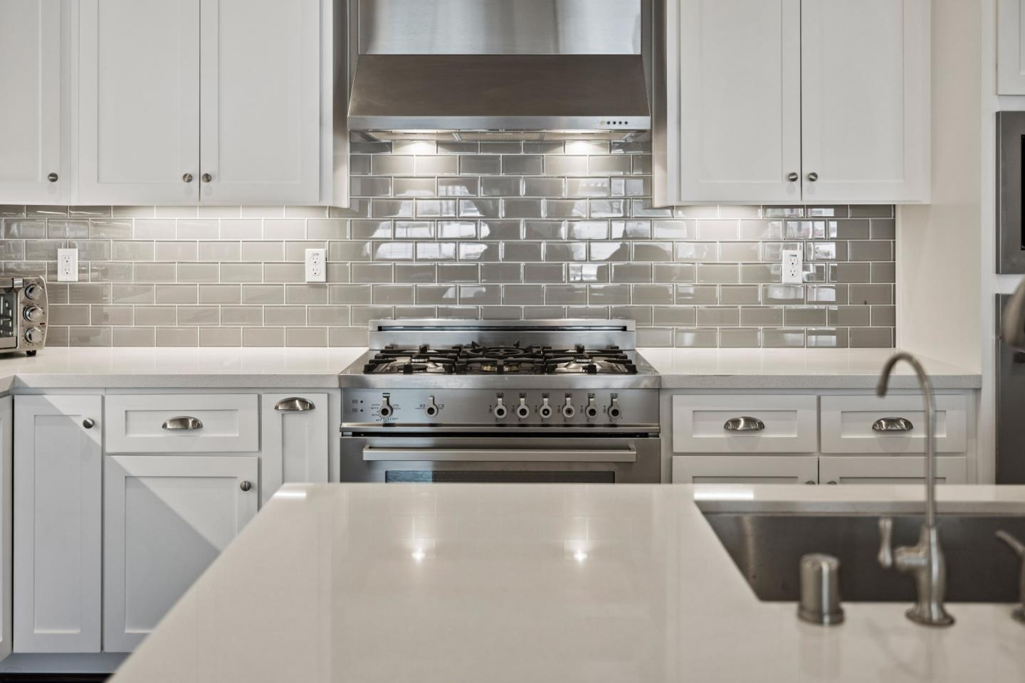 18511 McClellan Circle East Garrison, CA 93933 - Photo 12 of 65 a kitchen with a stove and a sink