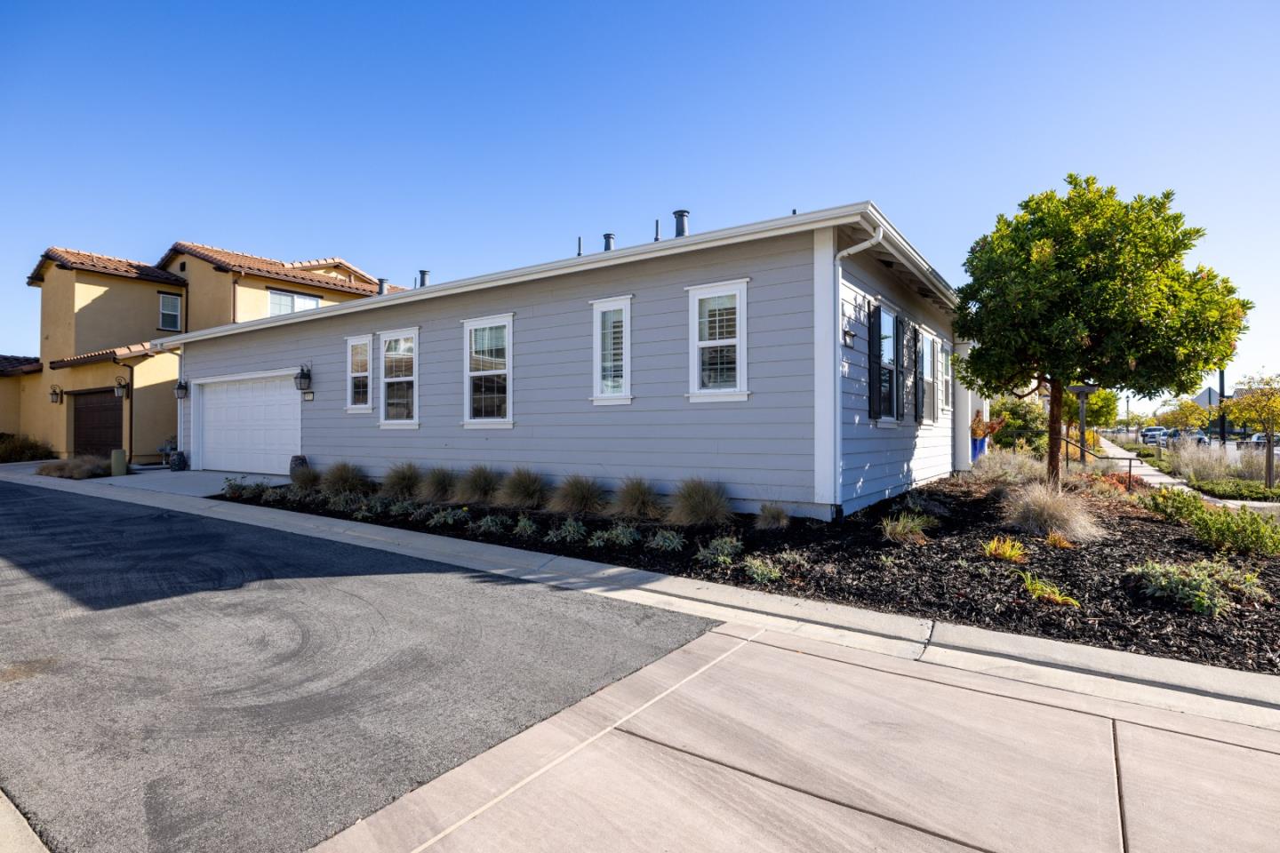 18511 McClellan Circle East Garrison, CA 93933 - Photo 63 of 65 a front view of a house with a yard