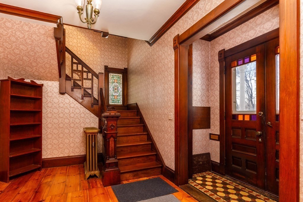 196 Chestnut Street Gardner, MA 01440 - Photo 13 of 30 a view of entryway and hall with wooden floor