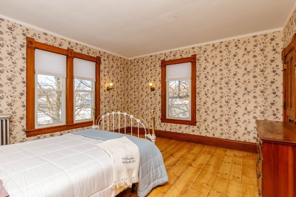 196 Chestnut Street Gardner, MA 01440 - Photo 16 of 30 a bedroom with a bed and a large window with outer view