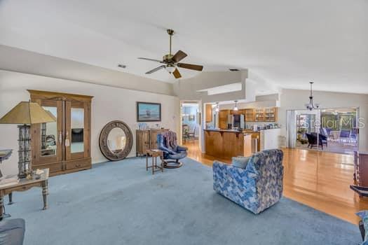507 Surrey Lane Lutz, FL 33549 - Photo 20 of 27 a view of a livingroom with furniture and a mirror