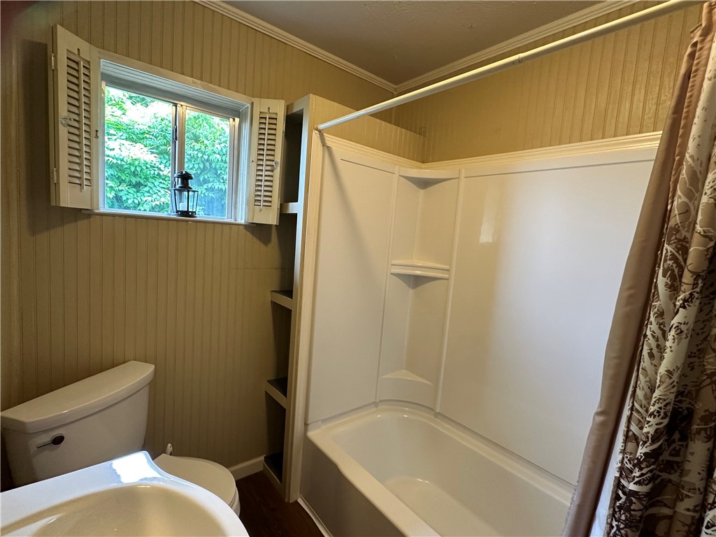 230 Lola Johnson Road Corpus Christi, TX 78418 - Photo 15 of 40 a bathroom with a toilet and shower