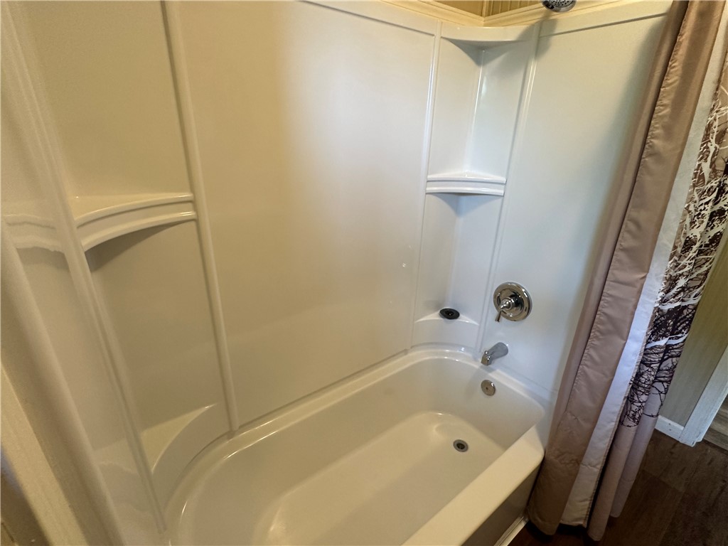 230 Lola Johnson Road Corpus Christi, TX 78418 - Photo 16 of 40 a bathroom with a bathtub