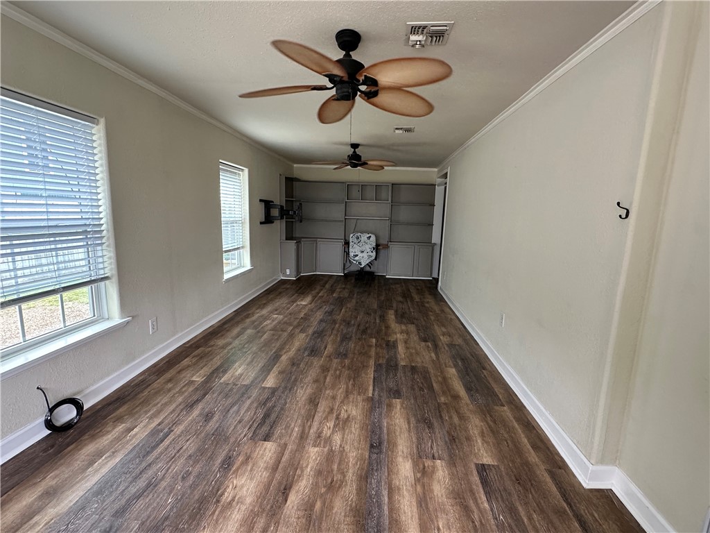 230 Lola Johnson Road Corpus Christi, TX 78418 - Photo 7 of 40 a view of an empty room with a window