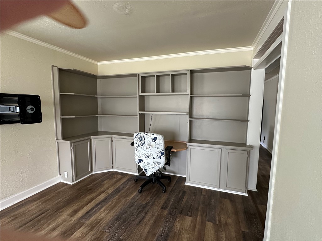 230 Lola Johnson Road Corpus Christi, TX 78418 - Photo 8 of 40 a room with wooden floor and shelf