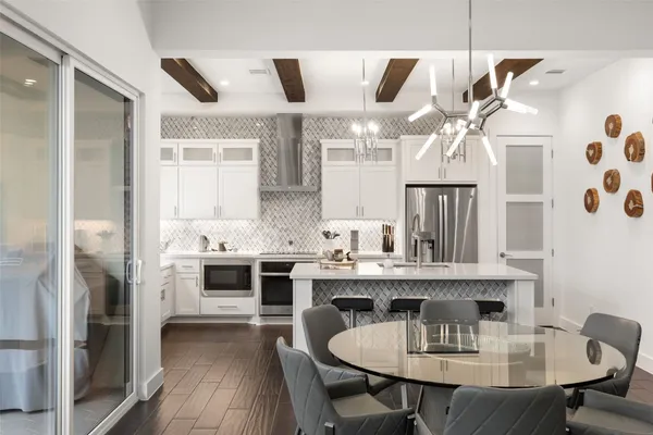 a view of kitchen with cabinets and wooden floor