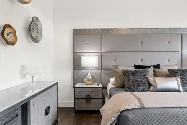 a living room with a bed and furniture